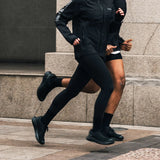 Runners in action wearing Mount to Coast gear and shoes #Color_black